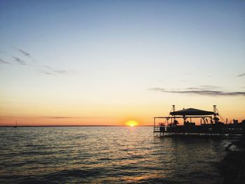 Scenic view of sea at sunset