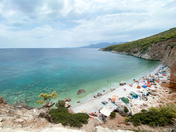 Scenic view of sea against cloudy sky