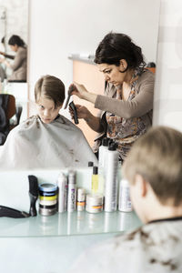 Boy at hairdresser