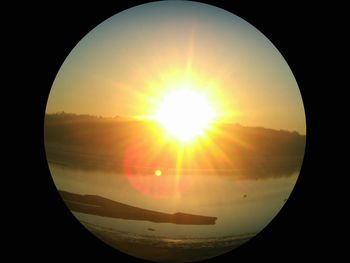 Scenic view of sunset seen through airplane window