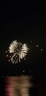 Firework display at night