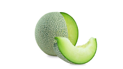 Close-up of fruit against white background