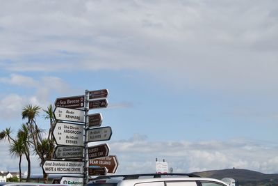 View of road sign against sky