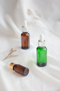 High angle view of bottles on table