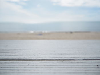 Surface level of beach against sky