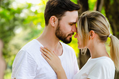 Young couple kissing outdoors