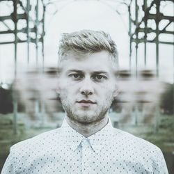 Multiple exposure of young man standing outdoors