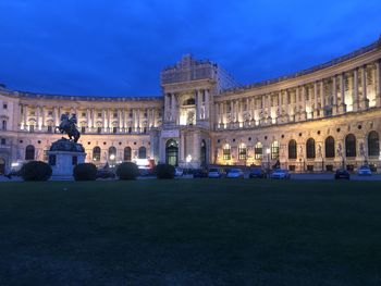 Parliament building against sky at dusk