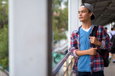 Young man looking away