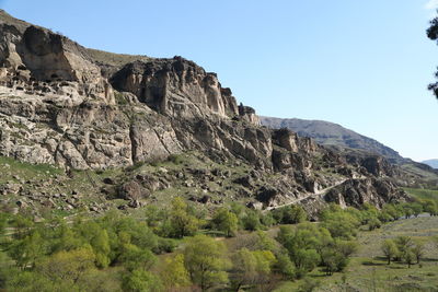 Scenic view of rocky mountains against clear sky