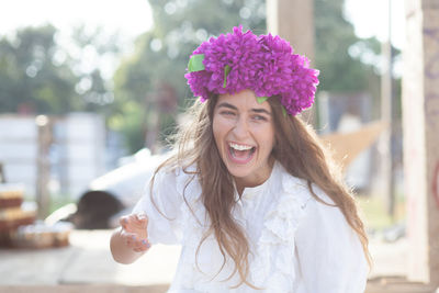 Happy woman wearing flowers