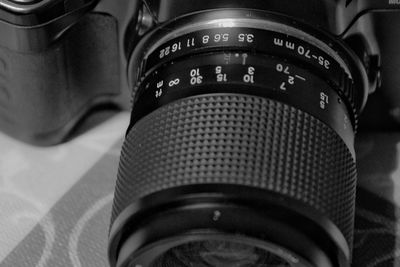 Close-up of camera on table