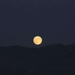 Low angle view of moon in sky