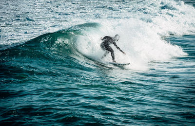 Man surfing in sea