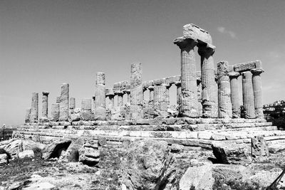 Old ruins of temple against clear sky