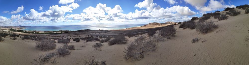 Panoramic view of beach against sky