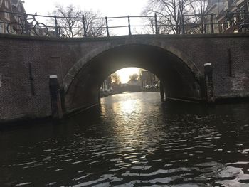 Arch bridge against sky