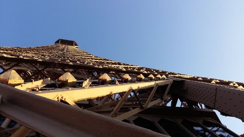 Amusement park against clear sky