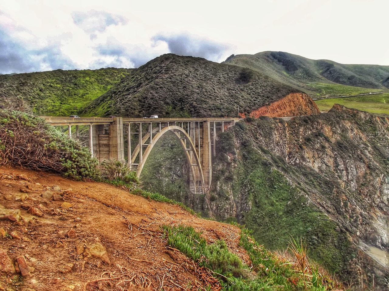 mountain, bridge - man made structure, built structure, sky, connection, architecture, tranquility, scenics, tranquil scene, nature, landscape, plant, water, grass, beauty in nature, railing, day, tree, cloud - sky, non-urban scene