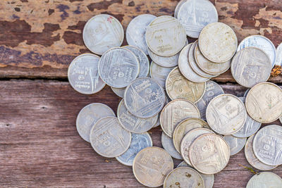 High angle view of coins on table