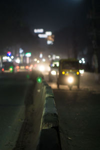 Close-up of illuminated street at night
