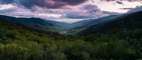 Scenic view of mountains against sky during sunset