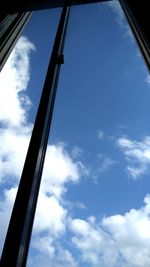 Low angle view of windmill against sky