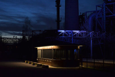 Low angle view of illuminated built structure at night