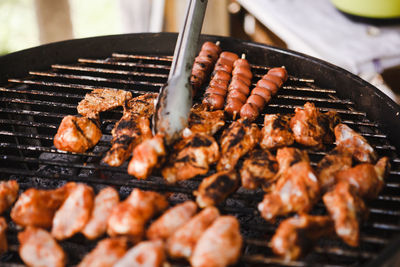 Close-up of meat on barbecue grill