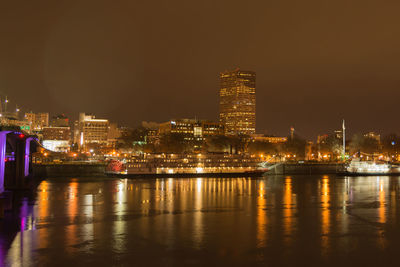 View of city lit up at night