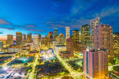 Buildings in city against sky