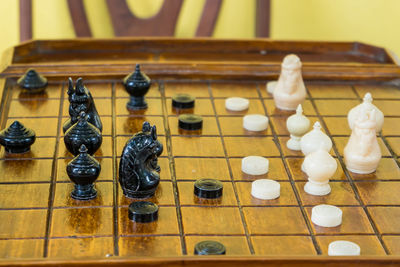 High angle view of chess pieces on table