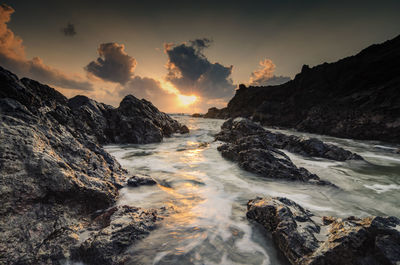 Scenic view of seascape against sky during sunset