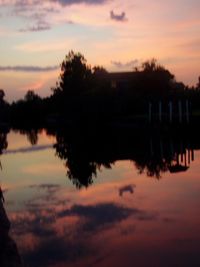 Reflection of clouds in lake during sunset