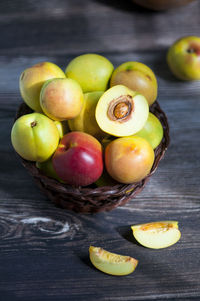 Delicious fresh peaches on the rustic wooden table