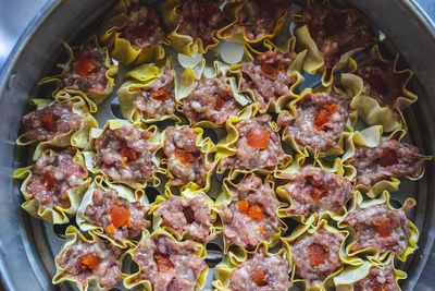 High angle view of meat in container