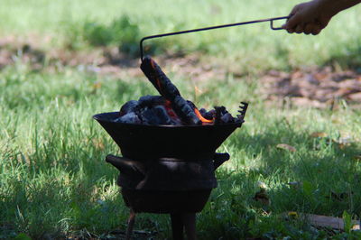 Close-up of barbecue grill on grass