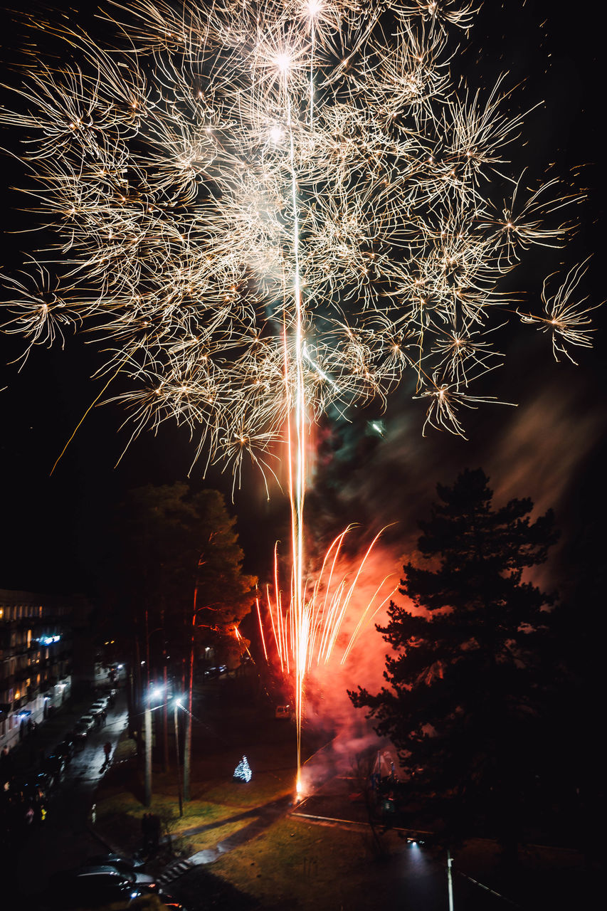 FIREWORK DISPLAY AGAINST SKY