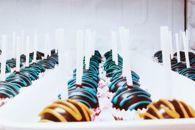 Close-up of candles on pastries