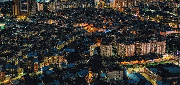 High angle view of city lit up at night in guangzhou