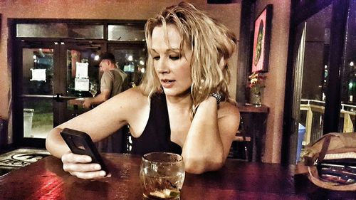 Woman sitting in restaurant