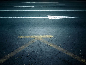 Arrow sign on road