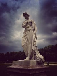 Low angle view of statue against sky