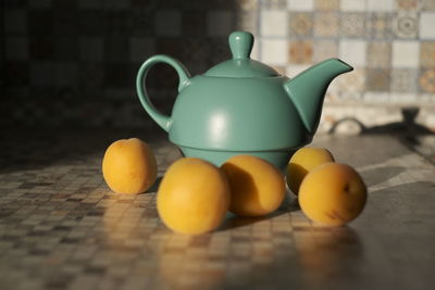 Close-up of oranges on table