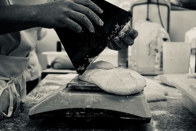 Close-up of person preparing food