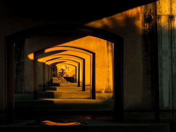 Illuminated corridor of building