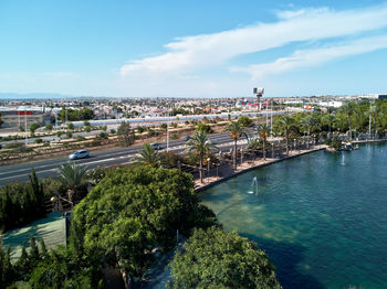 High angle view of swimming pool by sea against sky