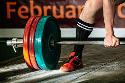 Close-up of man exercising in gym