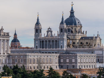 View of buildings in city against sky