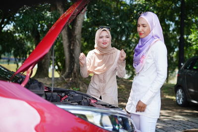 High angle view of girl and woman in car